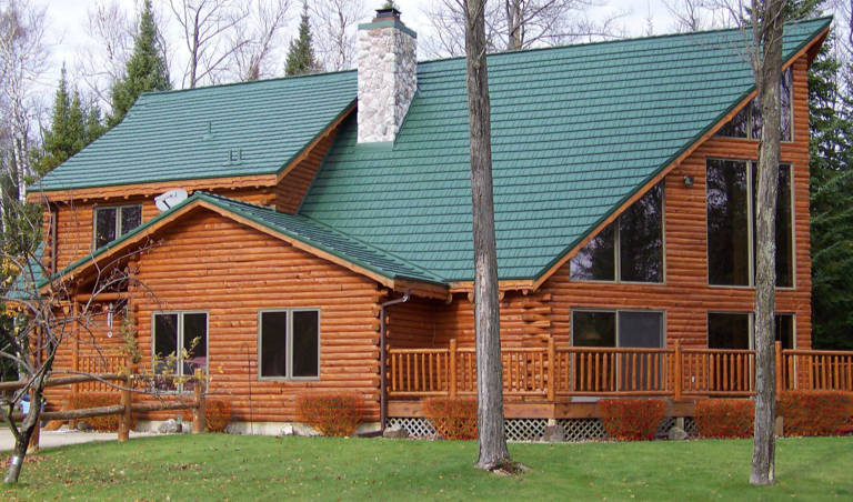 cabin with a metal roof